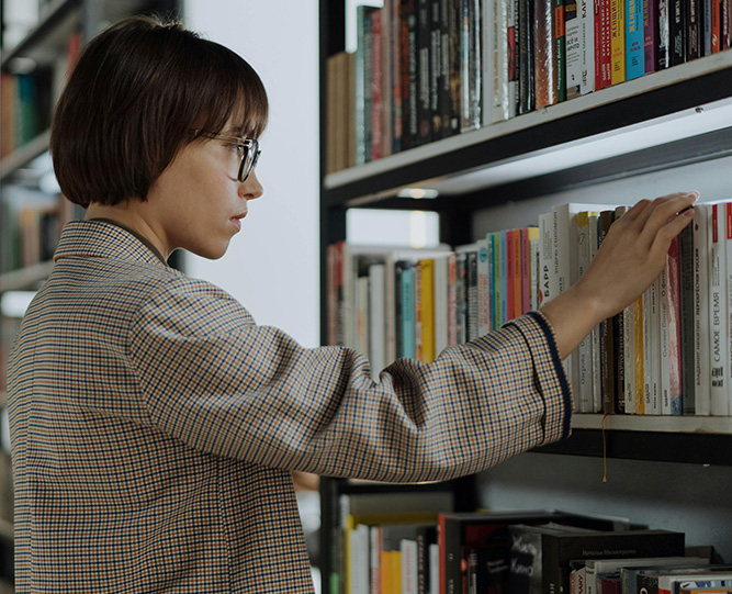 woman looking at books